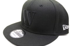 Hats: Black snapback cap with flat brim, large embroidered "W" on front, white New Era logo on side, and a "9FIFTY" round sticker on the brim.